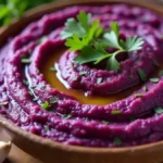 Purple sweet potato dishes: curry, hummus, pancakes, brownies, soup, tacos, salad