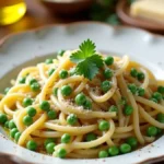 An assortment of pasta dishes featuring peas